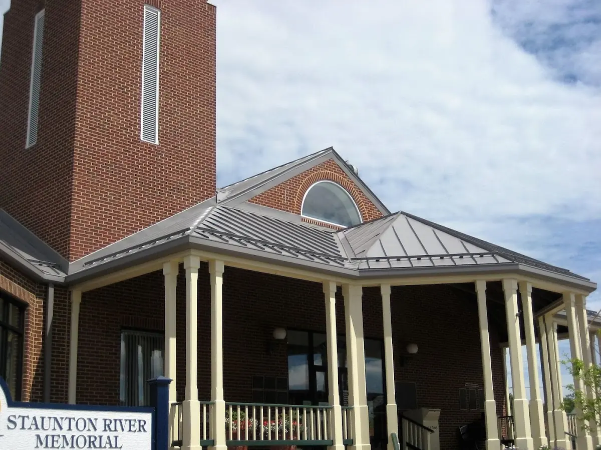 Skilled roofing craftsmen working on a residential roof in Monroeville
